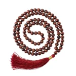 red tiger eye mala with white background